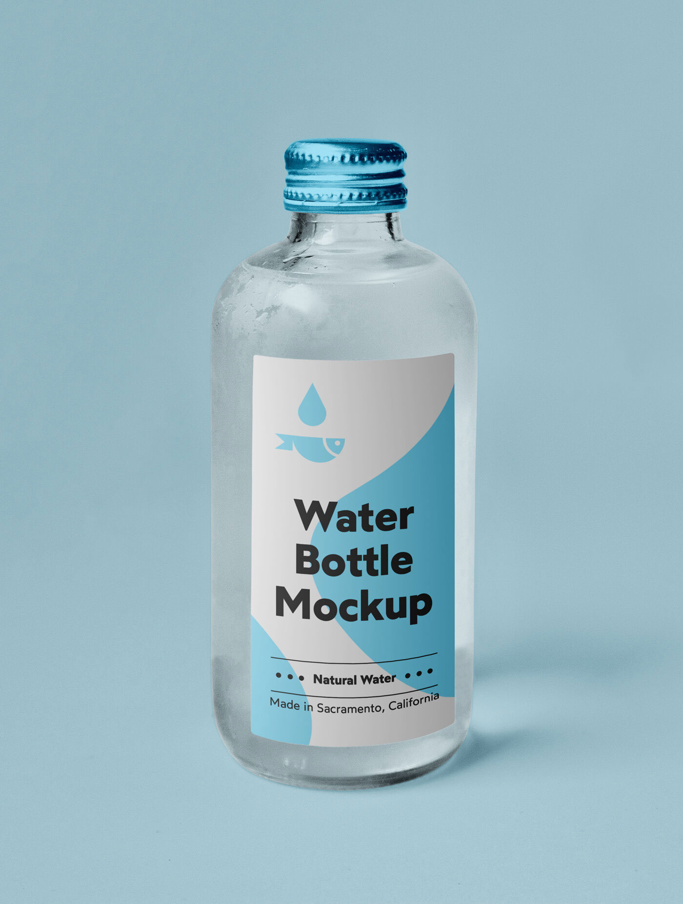 Mockup Showing a Minimal Mini Glass Bottle